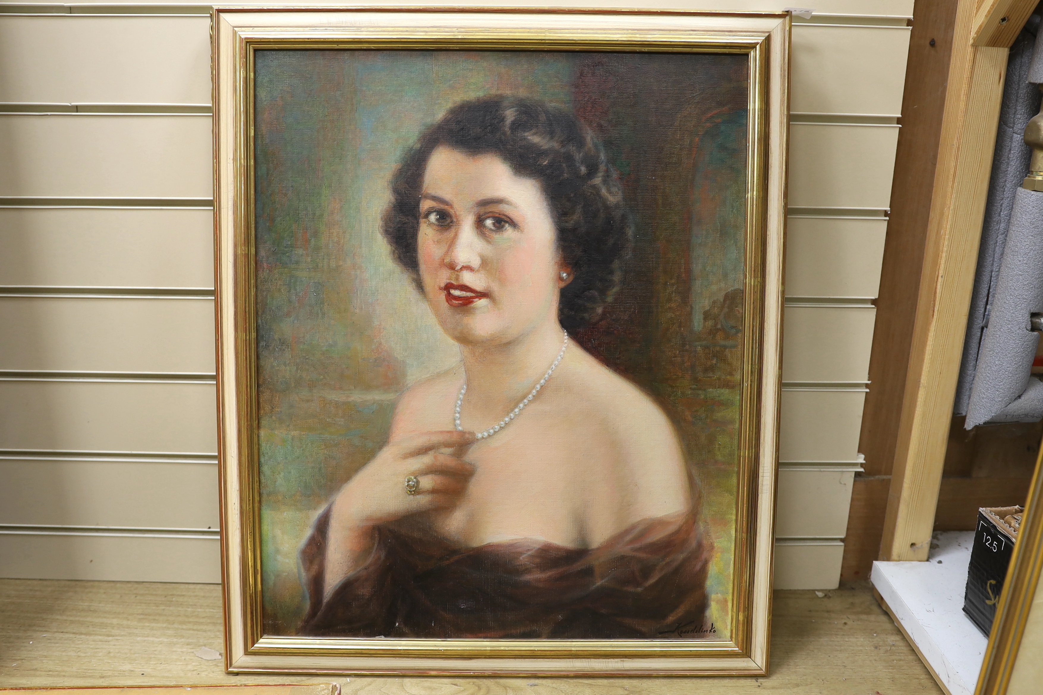 Kondelinko, oil on canvas, Portrait of a lady wearing a pearl necklace, signed, 59 x 48cm